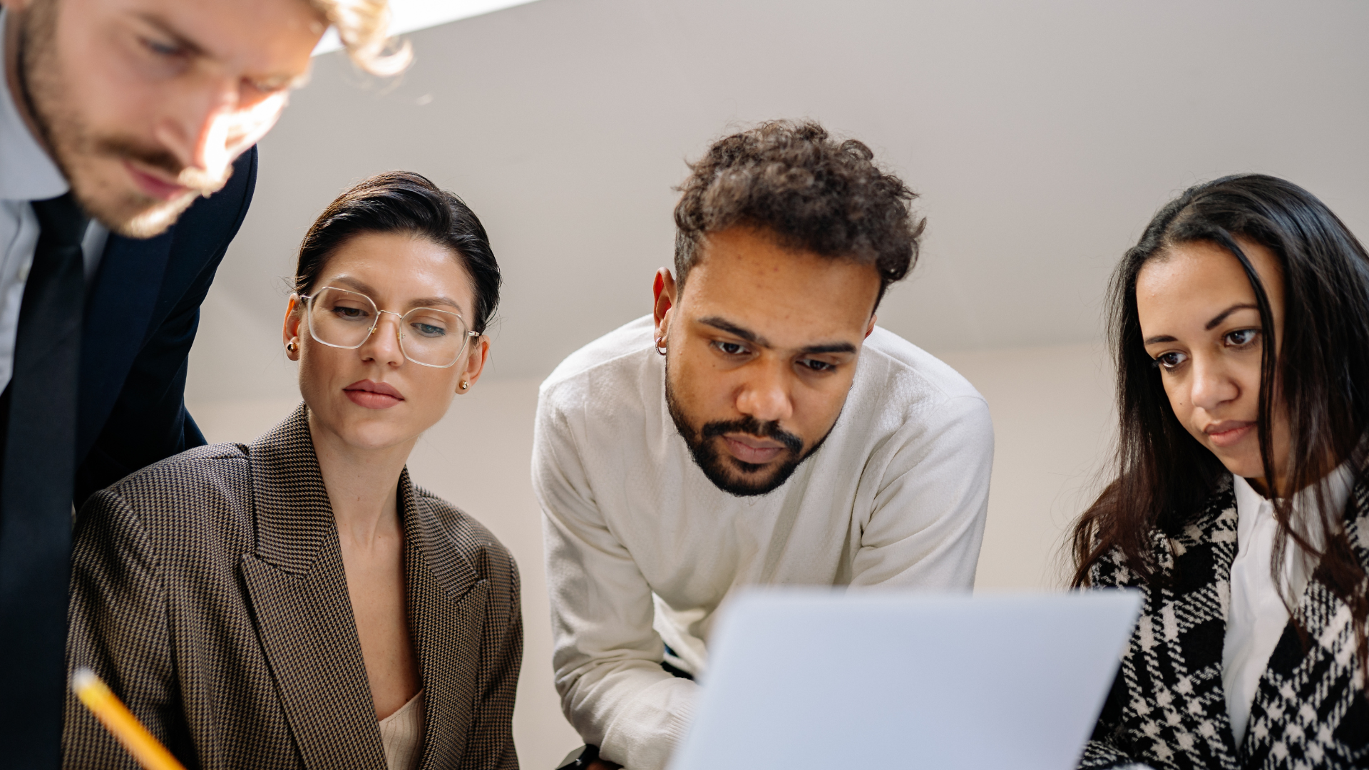 Meeting around a laptop