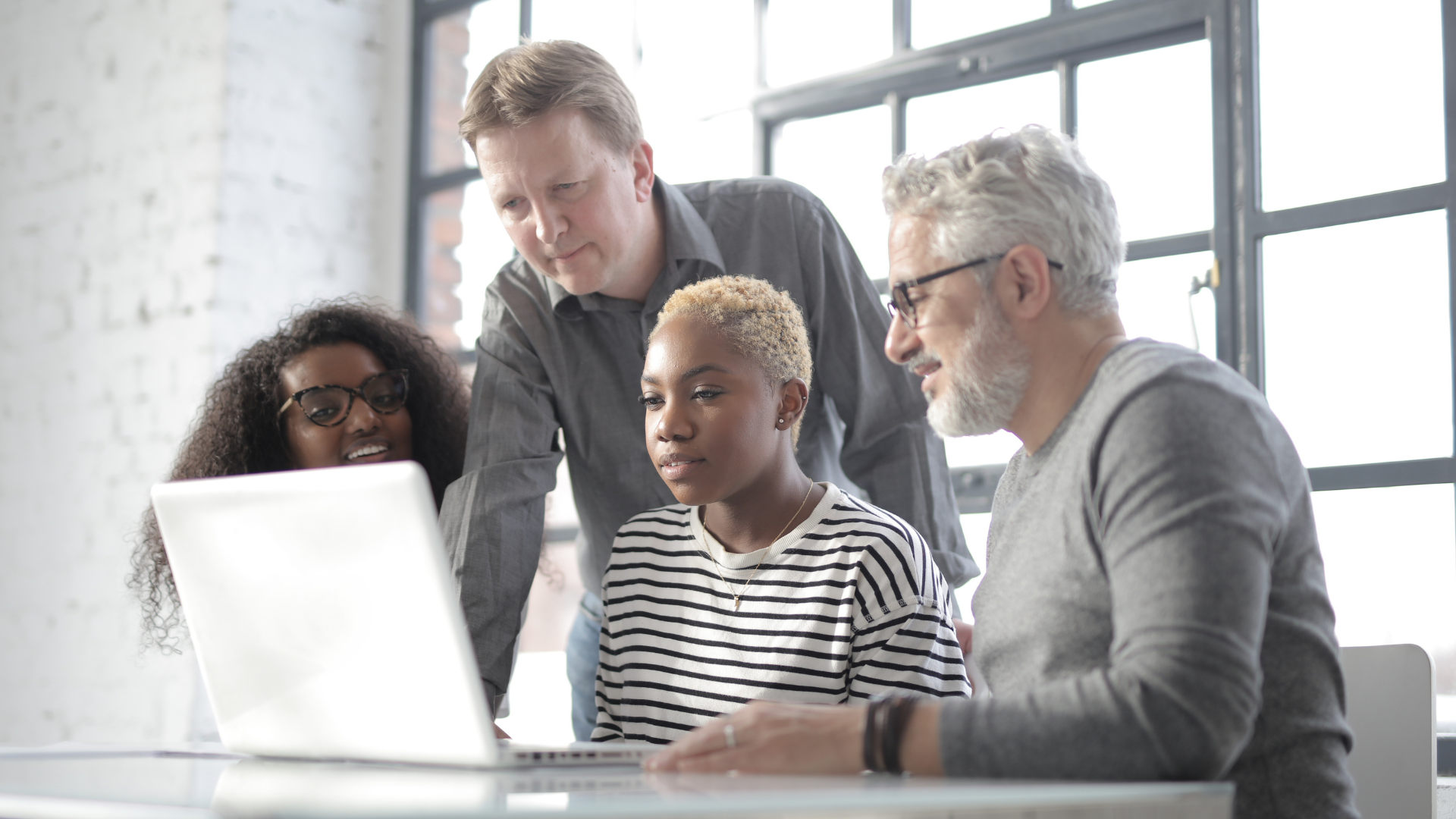 Group around a laptop
